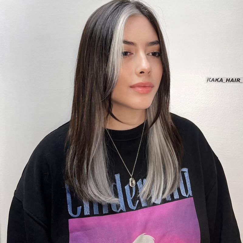 16. Platinum Front Streaks on Dark Brown Hair