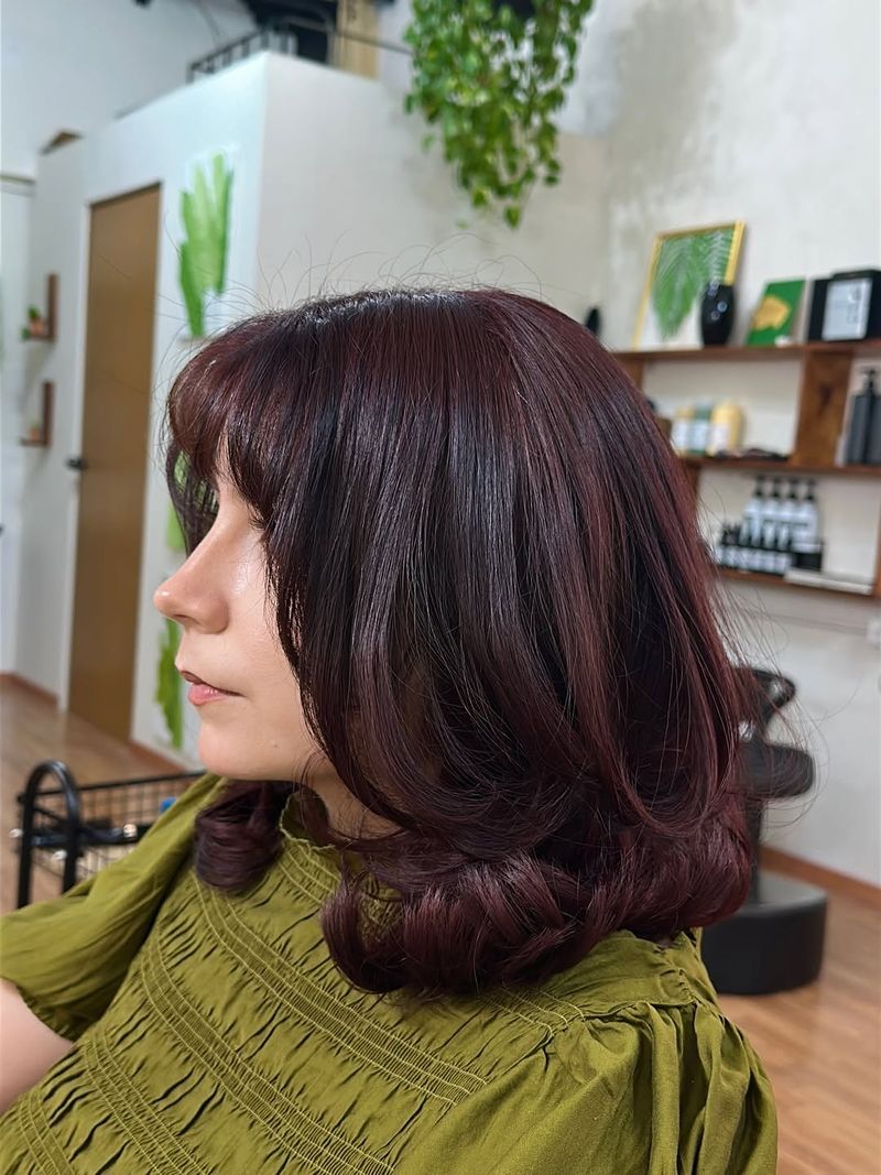 38. Plum Blowout Bob with Soft Bangs