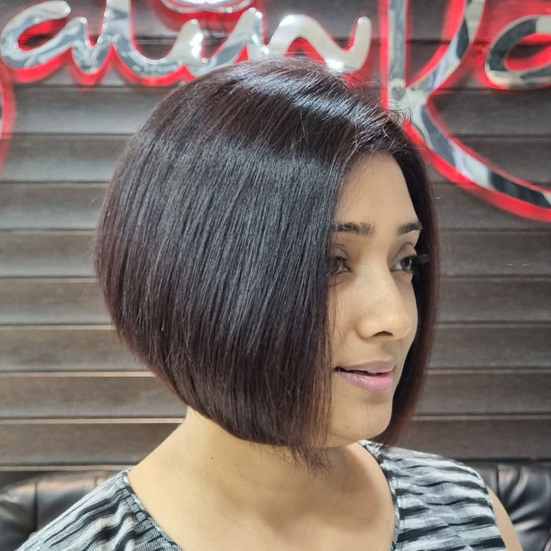 46. Polished Angled Brunette Bob