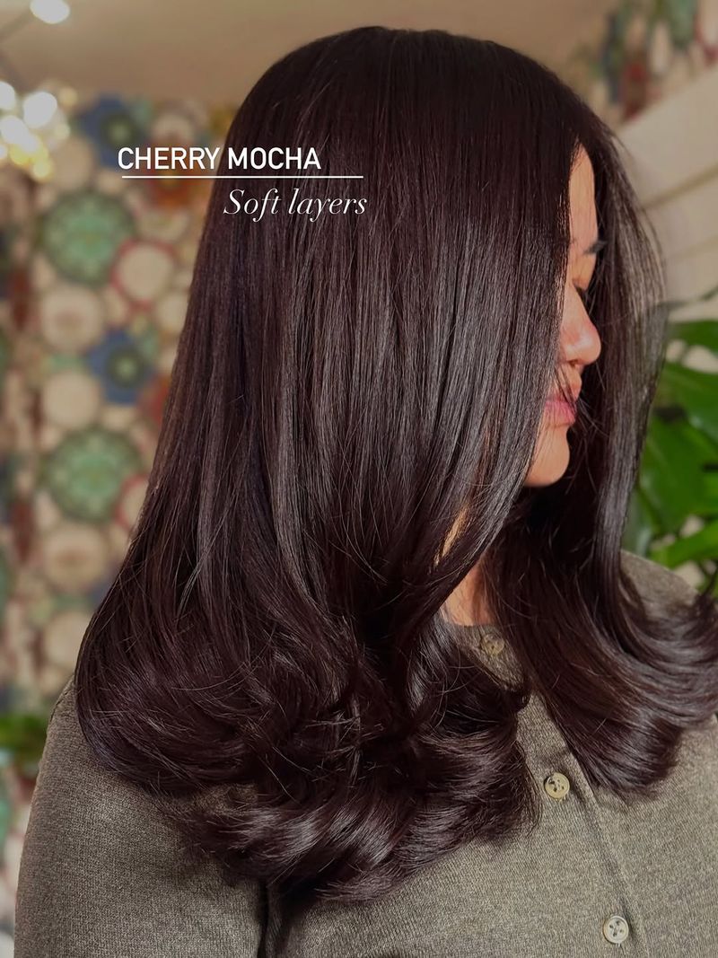 36. Polished Curls with Soft Layers