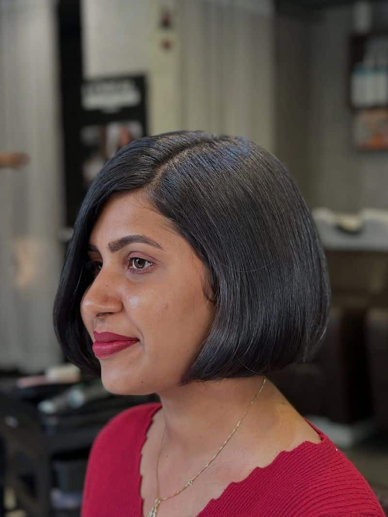 56. Polished Side-Parted Bob