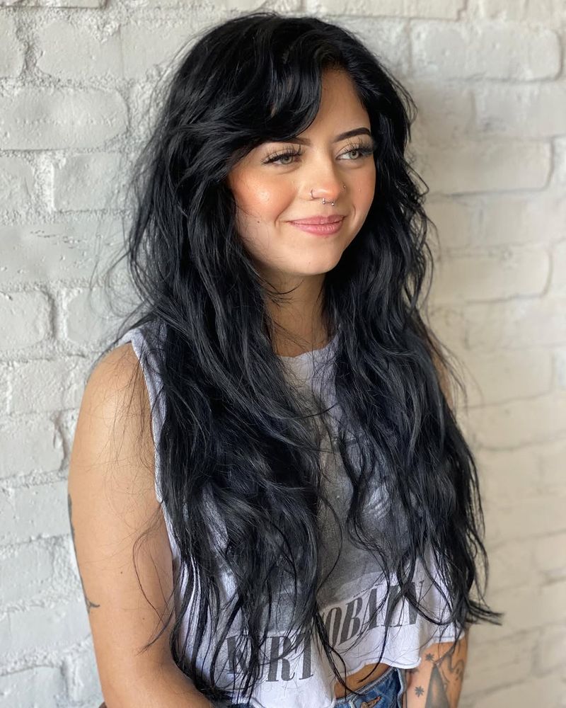 27. Raven Black Layered Shag with Heavy Side Bangs