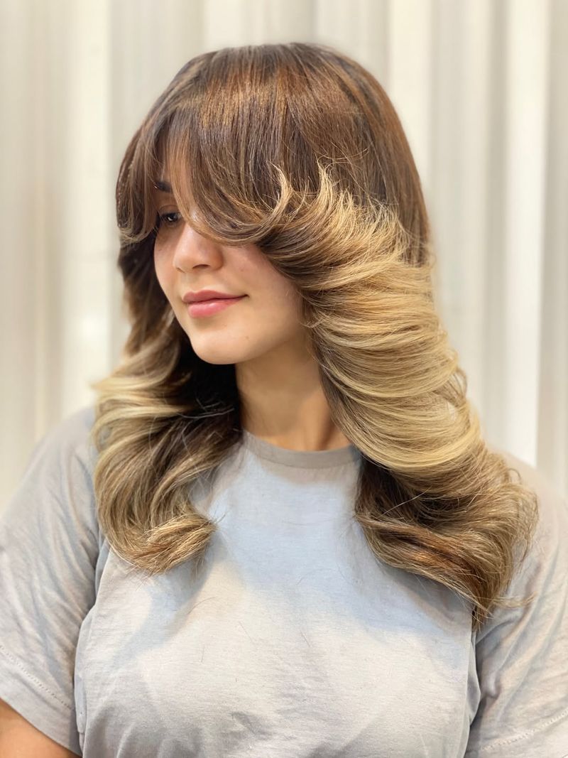 38. Retro Blowout with Dramatic Winged Fringe