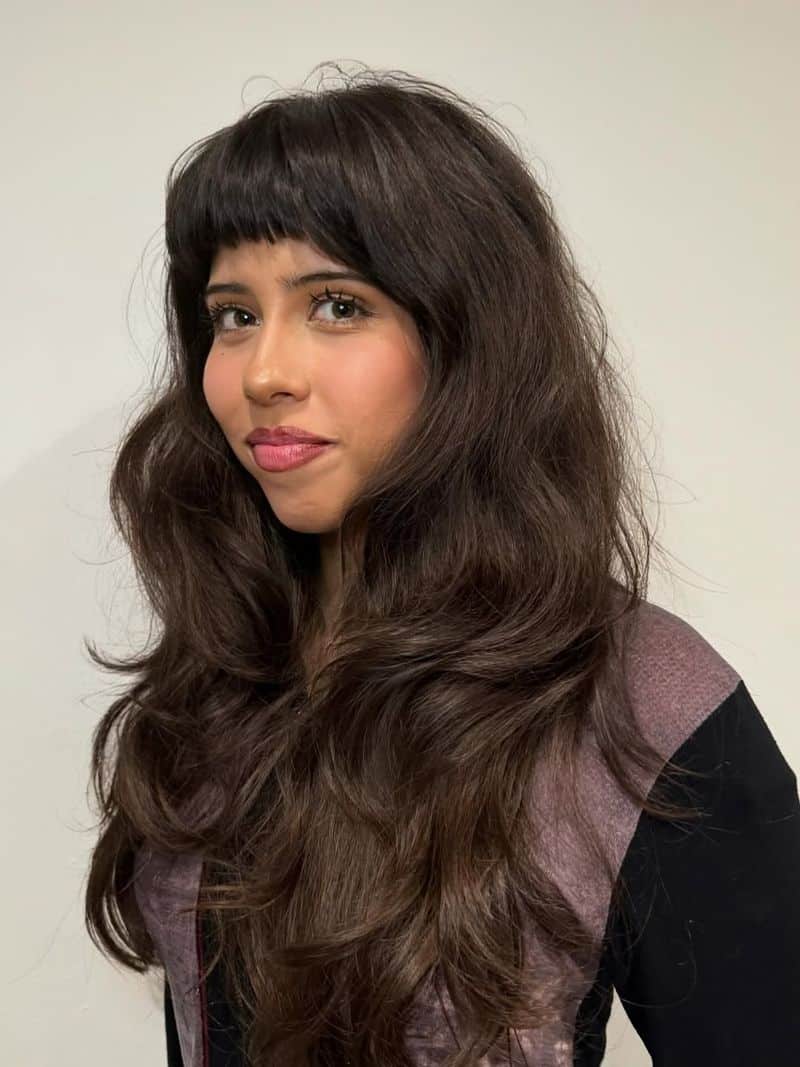 3. Retro Blowout with Piecey Micro Bangs