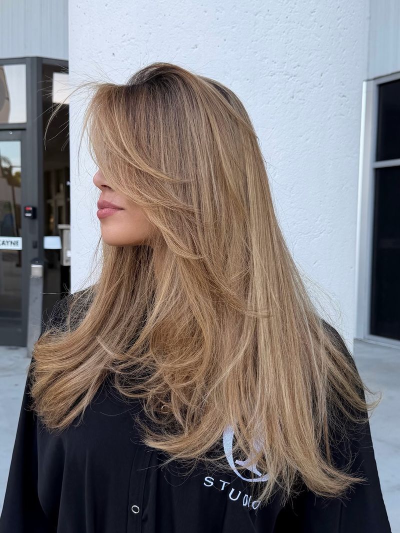 6. Sandy Blonde Blowout Layers