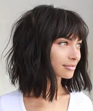 27. Shaggy Dark Lob with Full Fringe