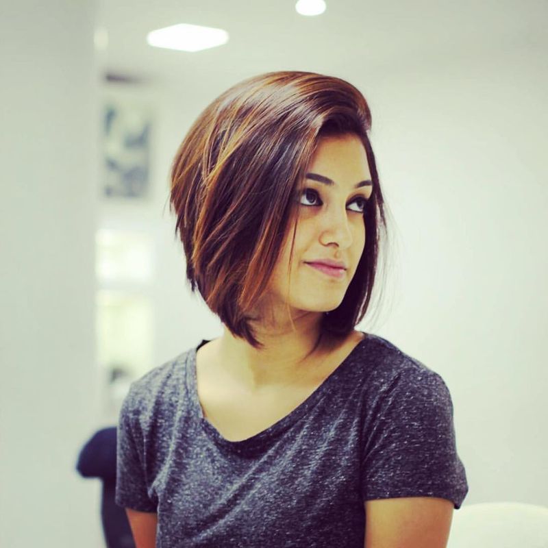 10. Side-Swept Caramel Stacked Bob