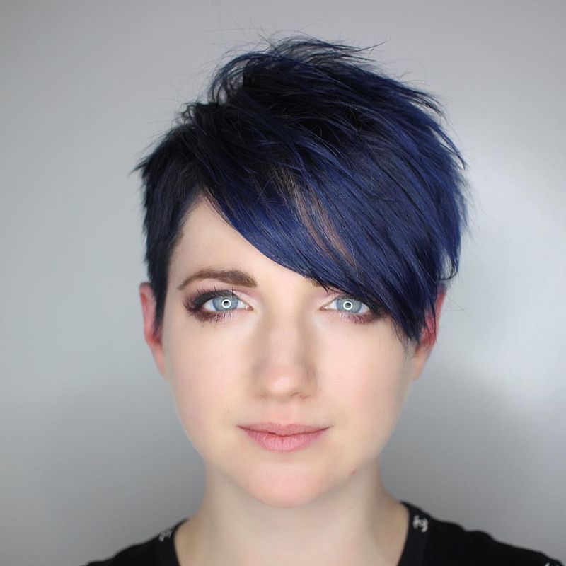 11. Side-Swept Pixie with Midnight Blue Tones