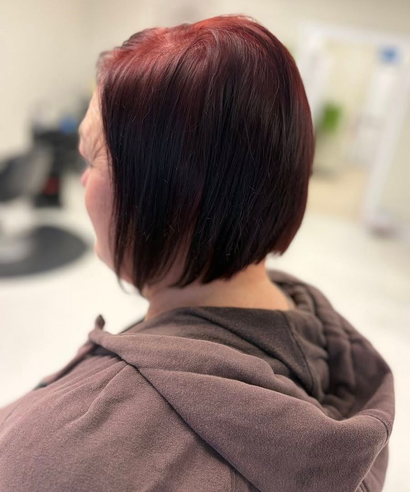 31. Sleek Angled Burgundy Bob
