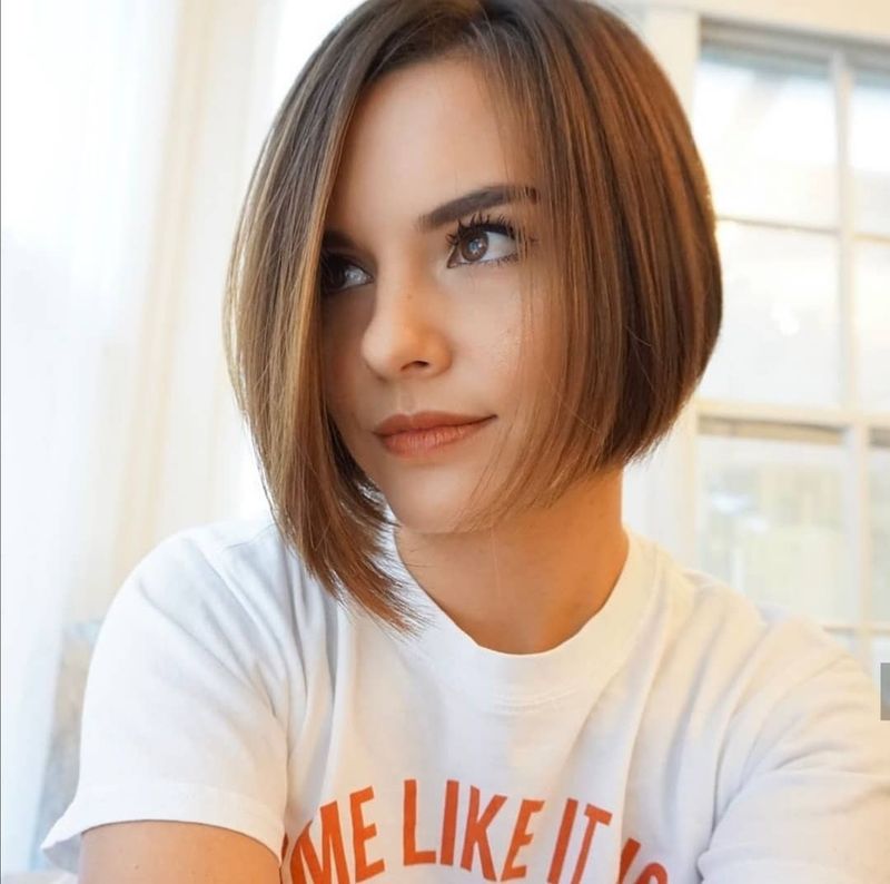 38. Sleek Asymmetrical Brown Bob
