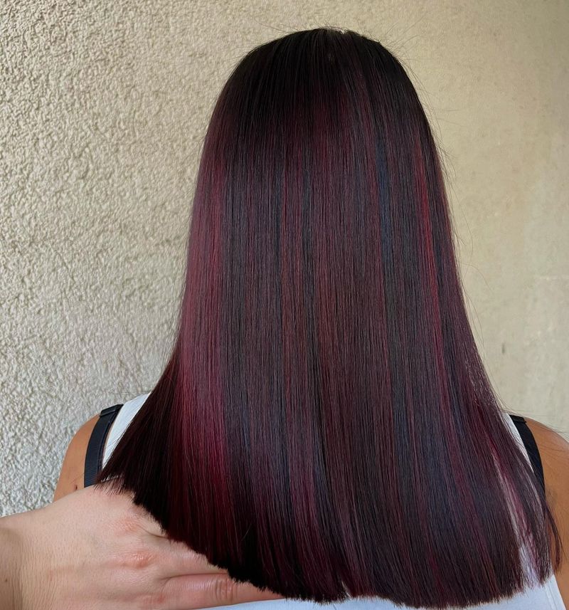 8. Sleek Burgundy and Black Highlights