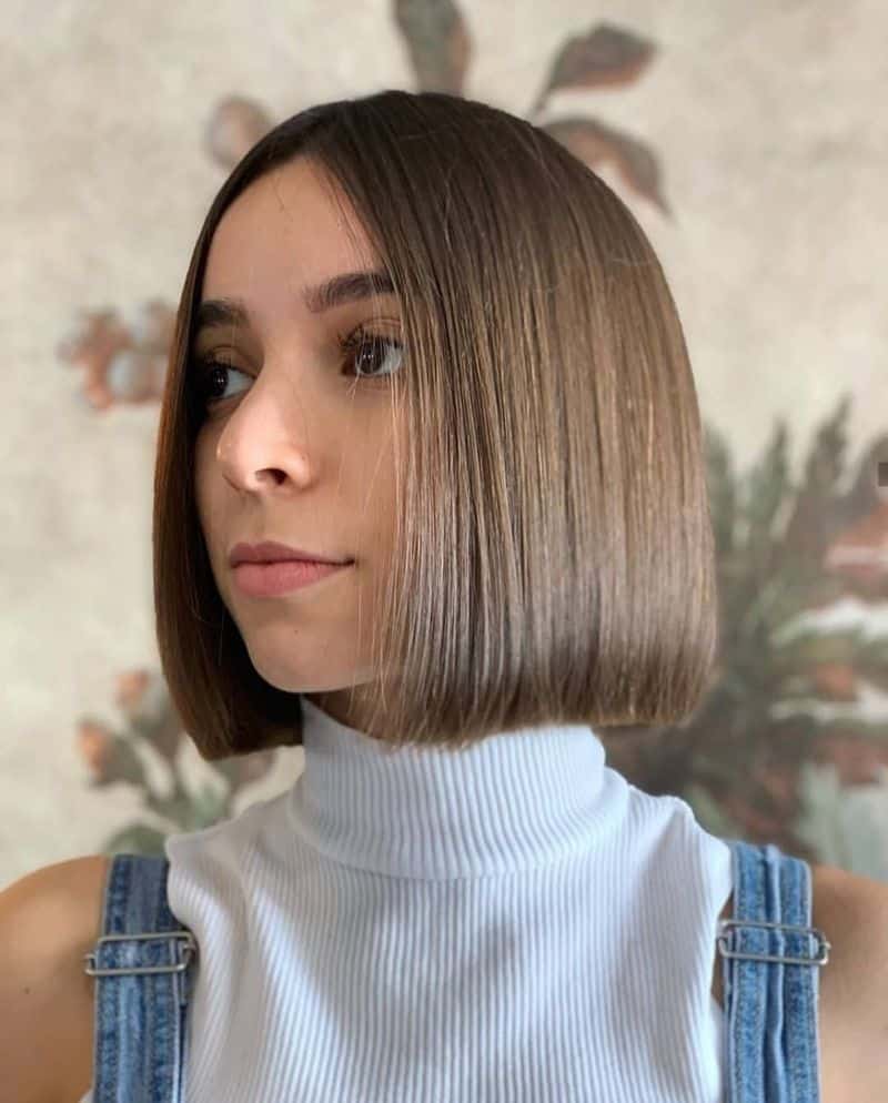 67. Sleek Center-Parted Chestnut Bob