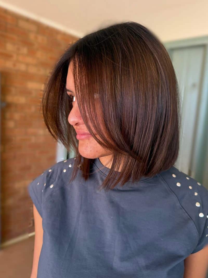 13. Sleek Chestnut Bob with Face-Framing Strands