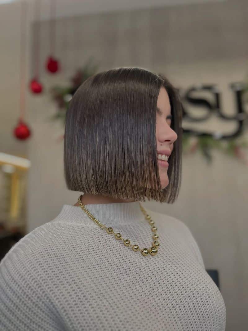 18. Sleek Glass Finish Blunt Bob