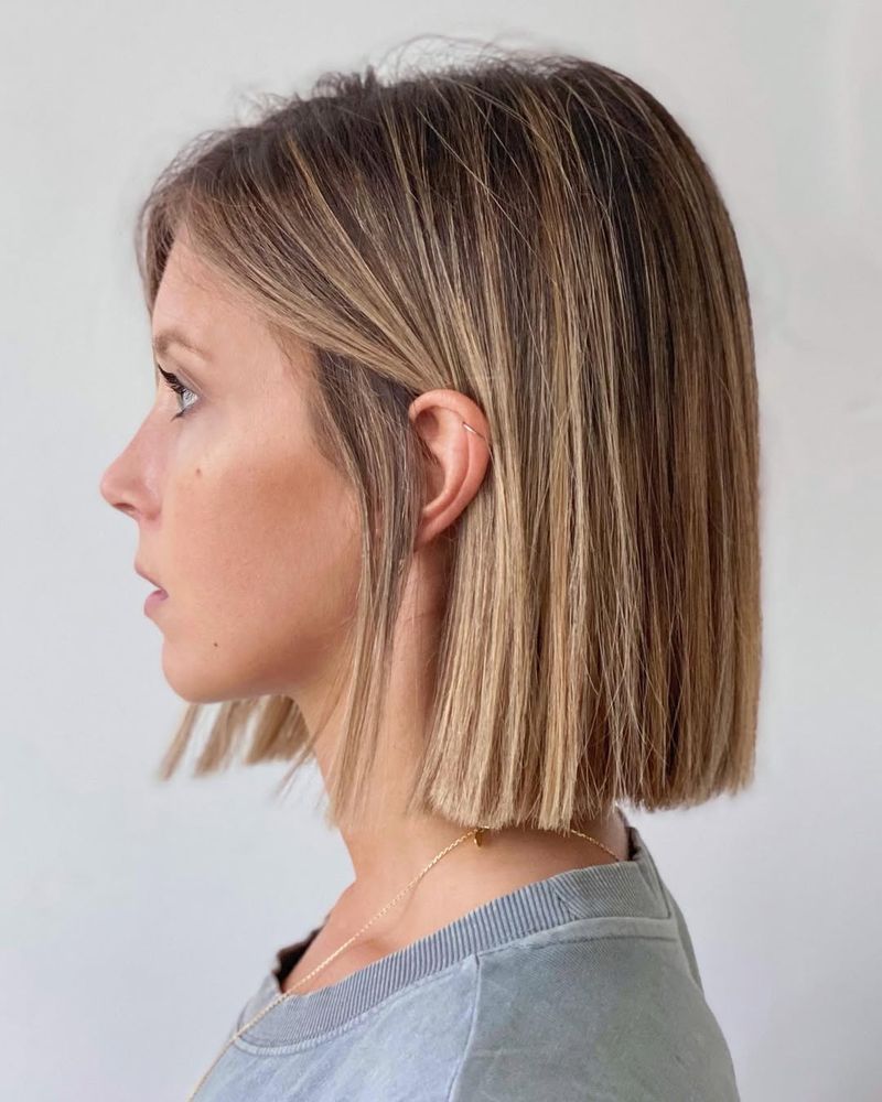 33. Sleek Honey Blonde Lob