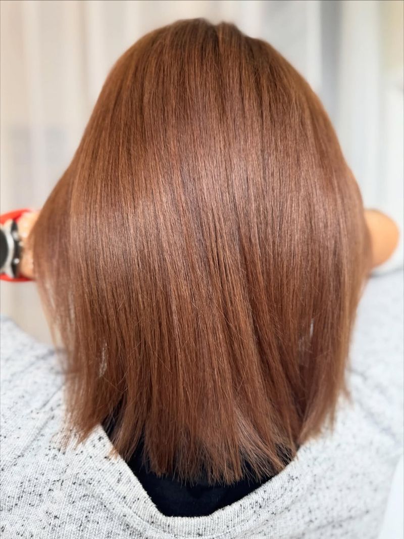 36. Sleek Honey Brown Shoulder-Length Cut