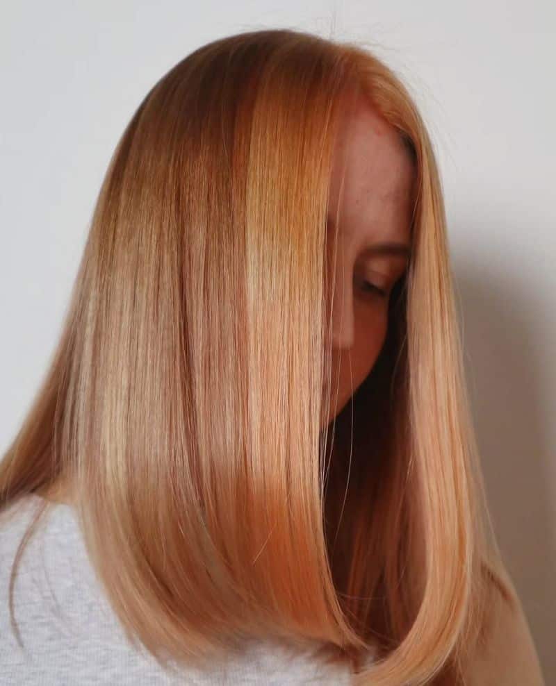37. Sleek Pastel Peach Straight Hair