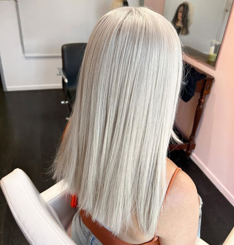 13. Sleek Silver Platinum Straight Hair