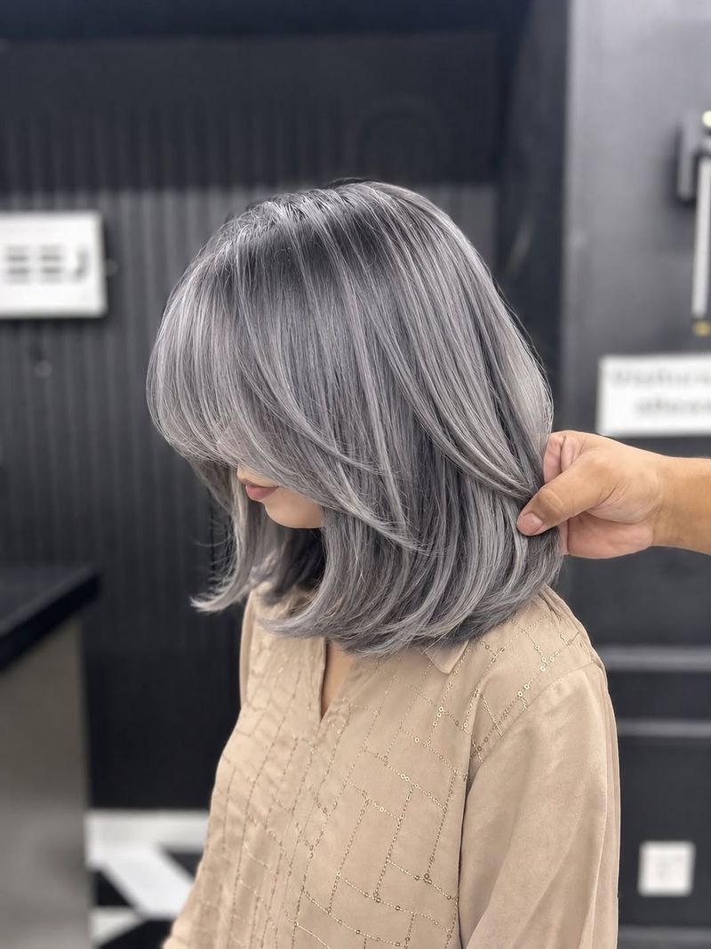 50. Smoked Silver Feathered Lob