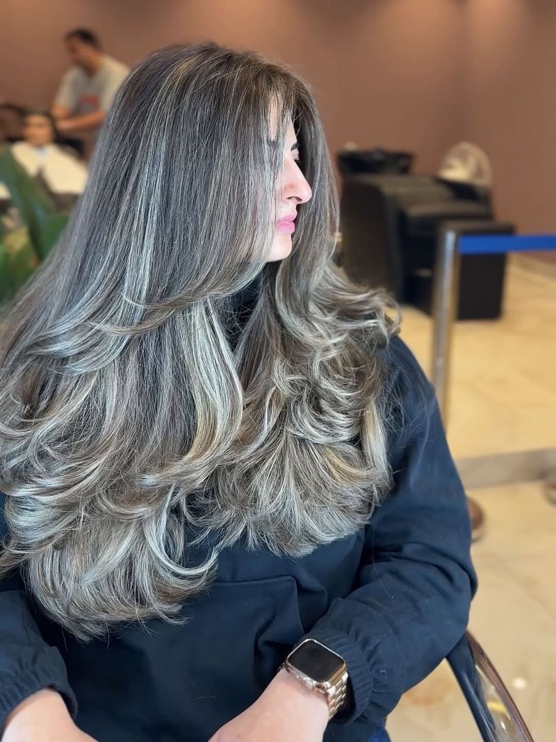 30. Smokey Silver Face-Framing Layers