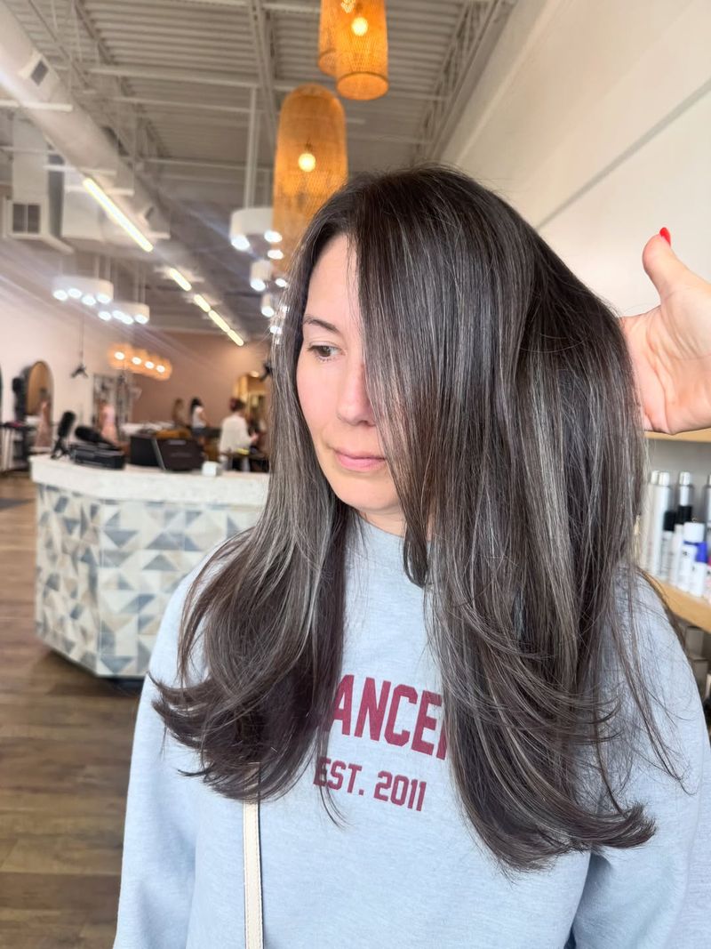 7. Smoky Charcoal Highlights on Dark Brown Hair