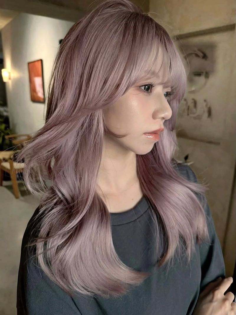 58. Smoky Lavender Layered Cut with Face-Framing Bangs