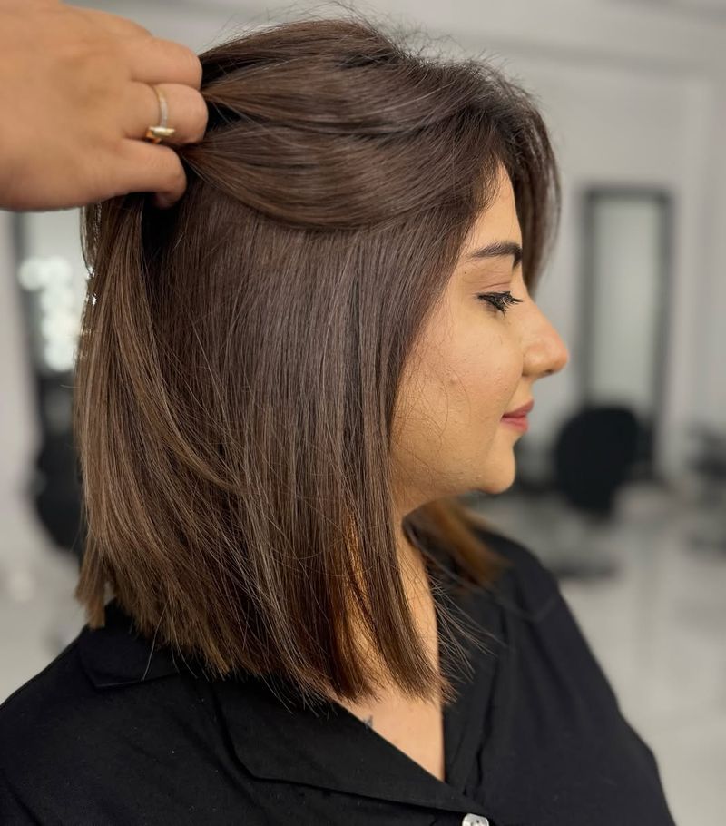 30. Smooth Ash Brown Layered Bob