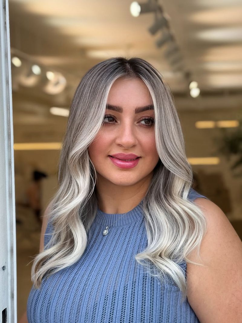 42. Smudged Roots with Bright Face-Framing Highlights