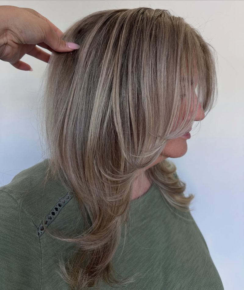 44. Soft Ash Blonde Face-Framing Layers