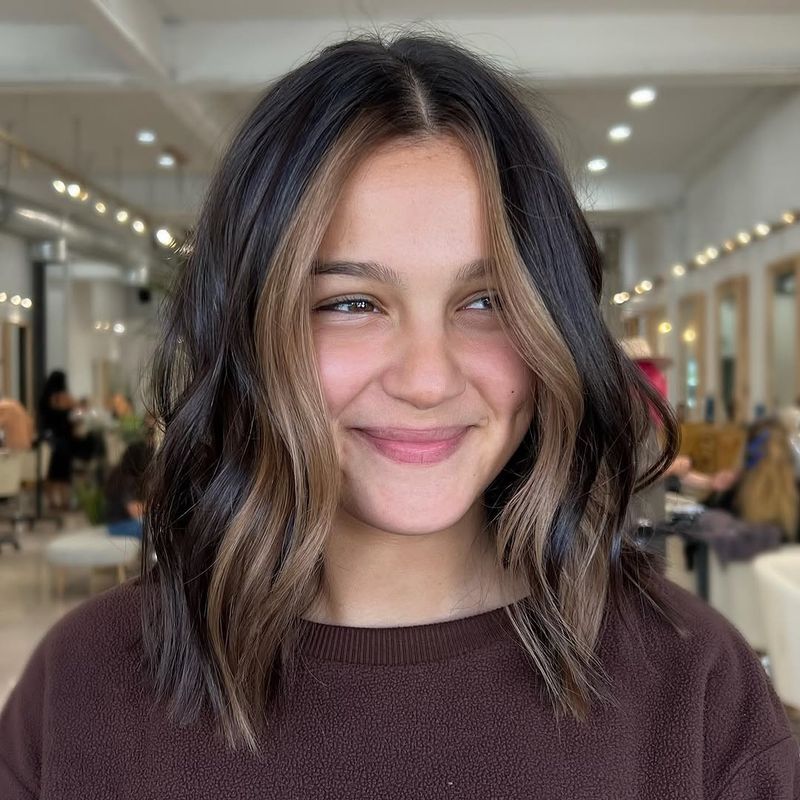 32. Soft Brunette Lob with Warm Honey Highlights