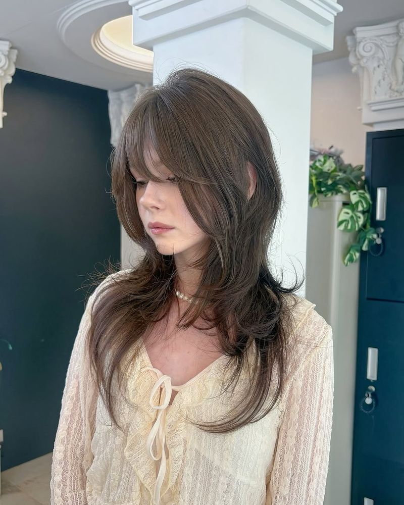33. Soft Butterfly Shag with Wispy Bangs