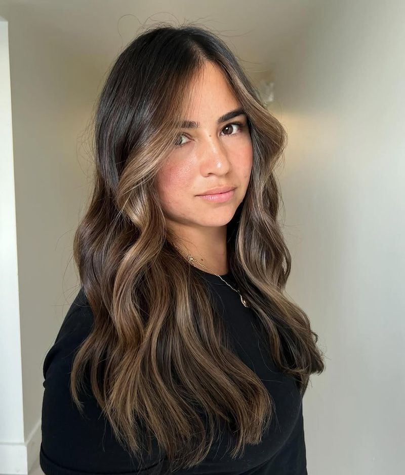 23. Soft Caramel Ribbons on Espresso Hair