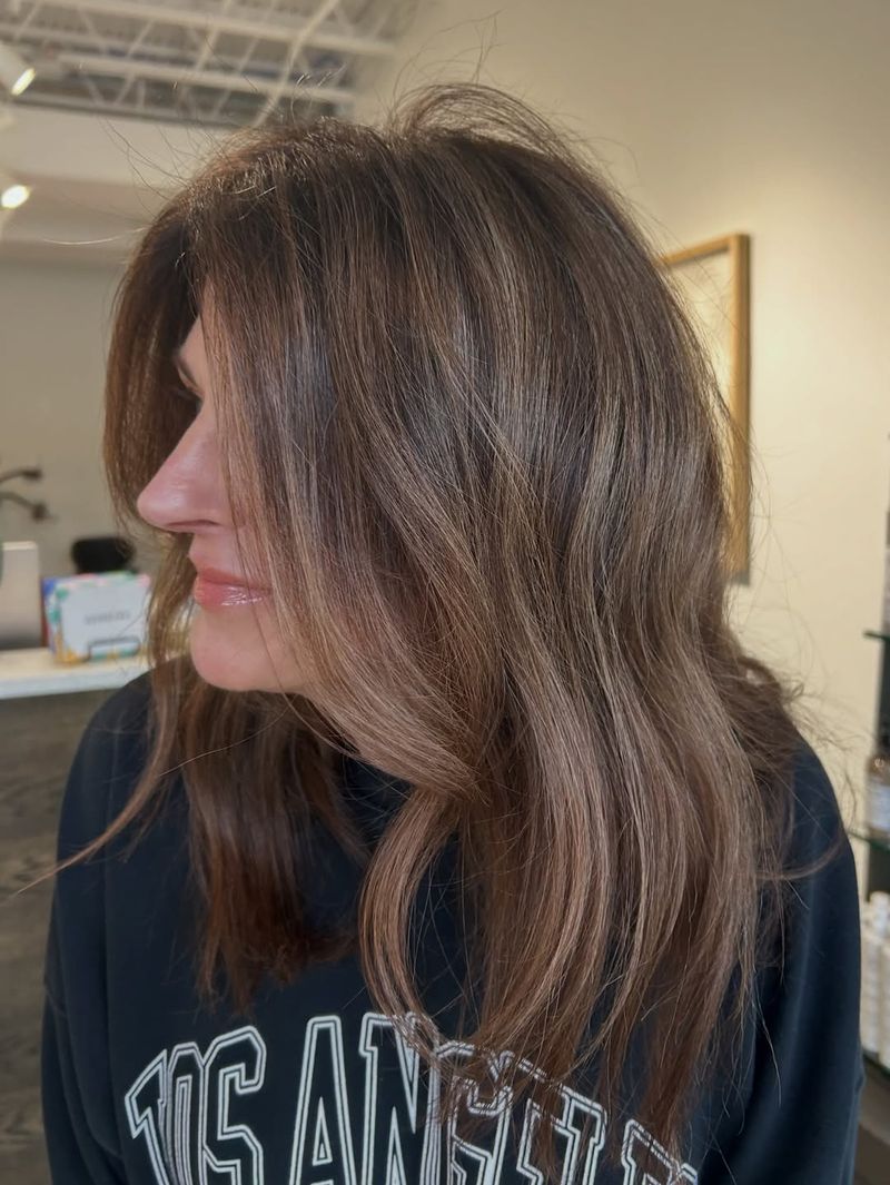 12. Soft Chestnut Balayage with Face-Framing Highlights