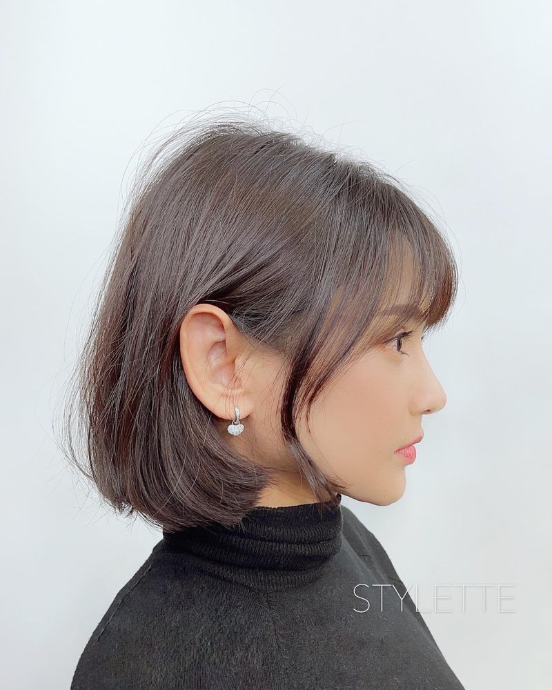 42. Soft Layered Bob with Tucked Sides