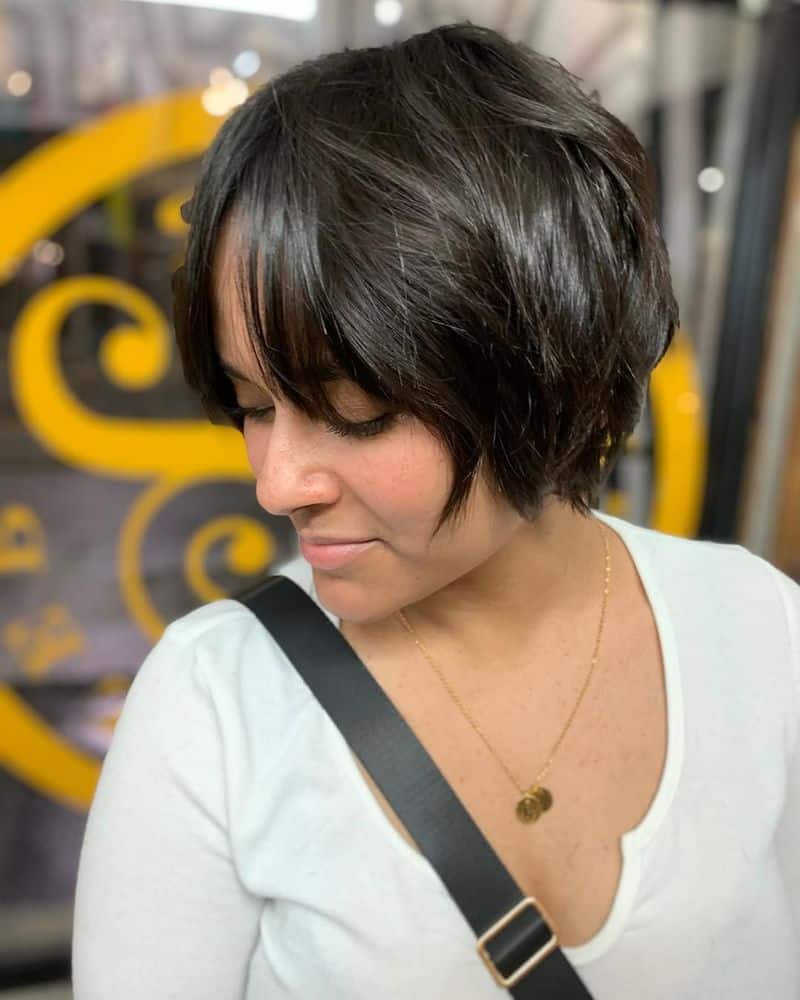 49. Soft Layered Dark Pixie with Wispy Bangs