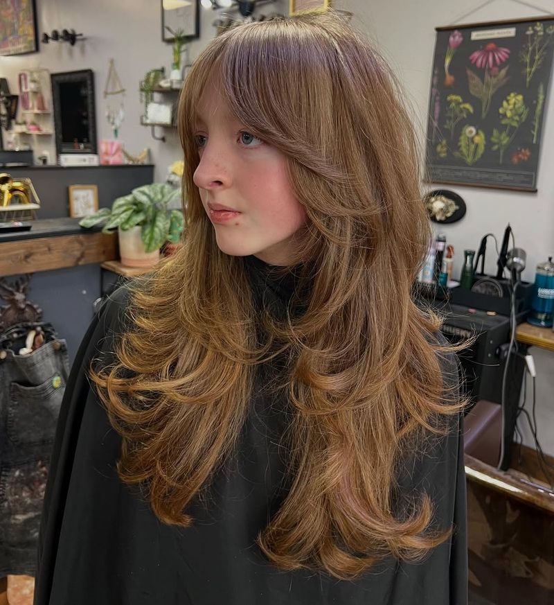 38. Soft Layers with Curtain Bangs