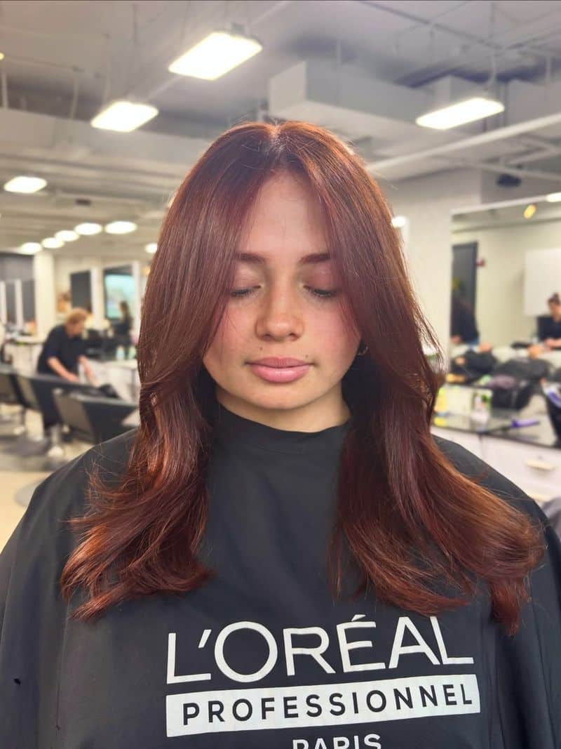 9. Soft Penny Tones with Curtain Bangs