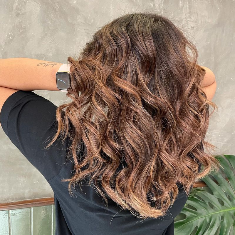 17. Soft Rose Gold and Chestnut Curls