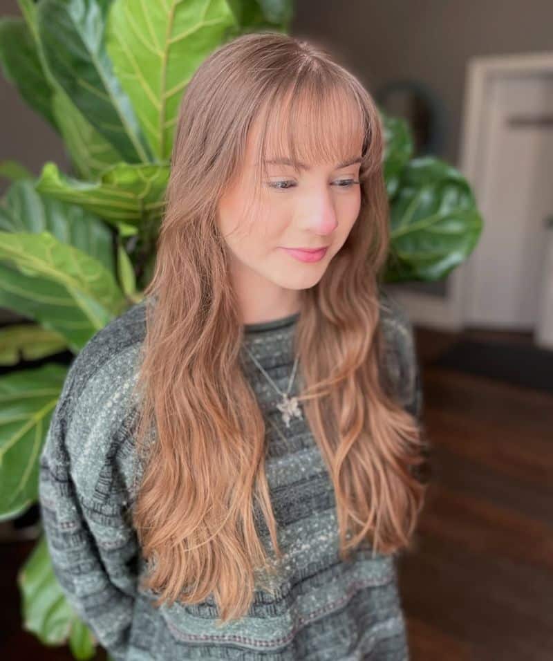 6. Soft Sandy Brown Waves with Delicate Fringe