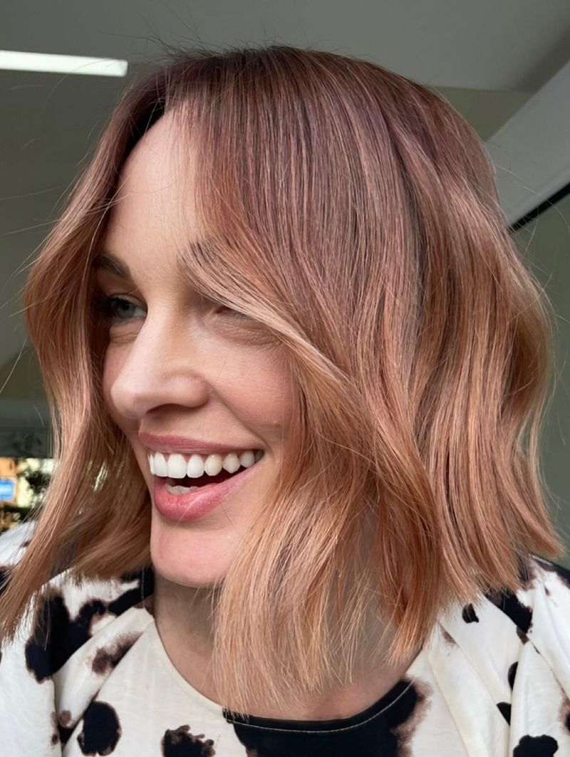 8. Soft Strawberry Bob with Curtain Bangs