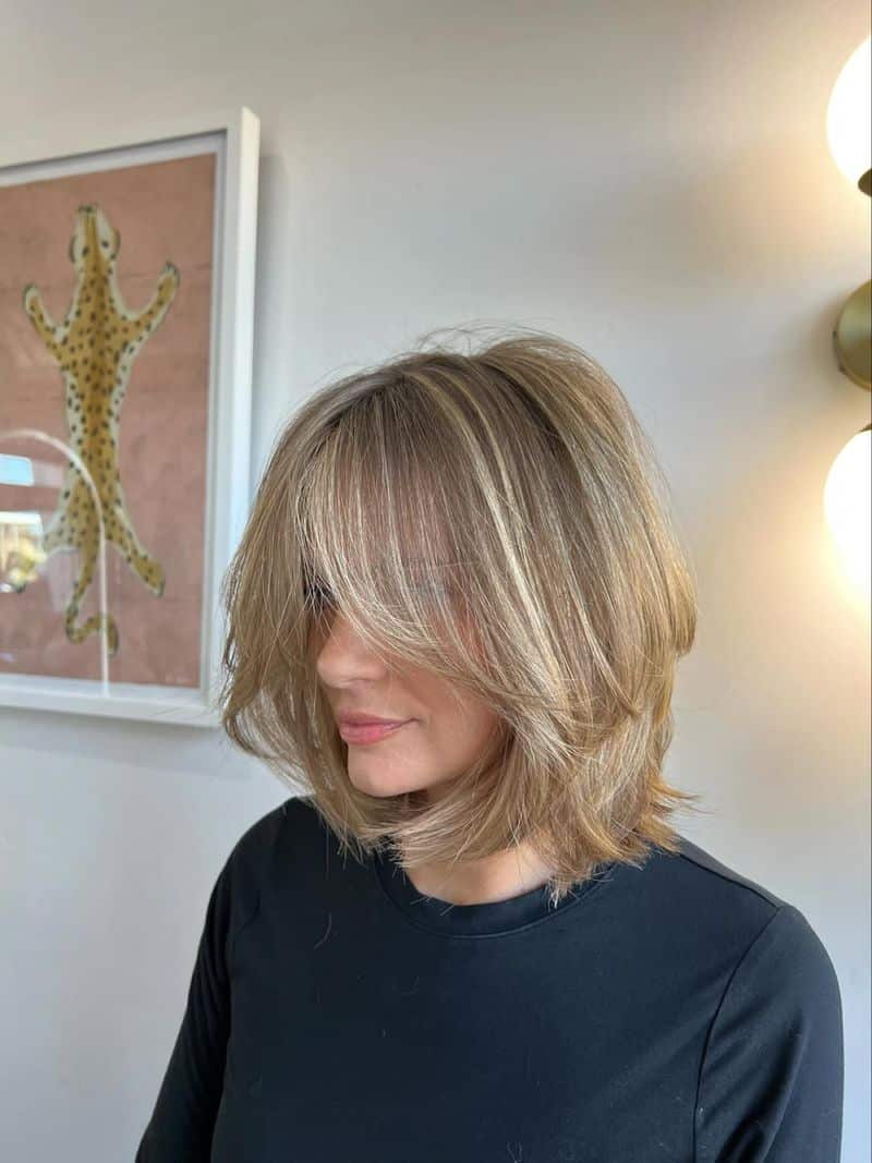 12. Softly Layered Lob with Wispy Fringe