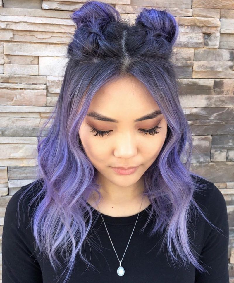 3. Space Buns with Braved Roots and Soft Waves
