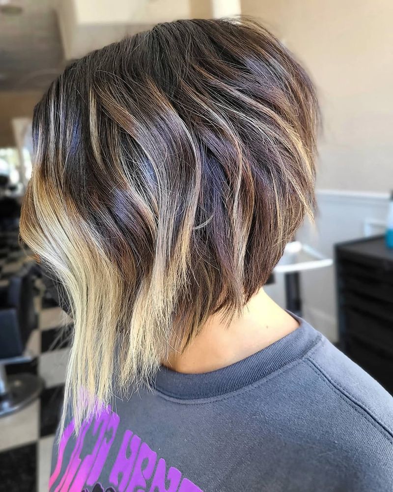 31. Stacked A-Line Bob with Honey Highlights