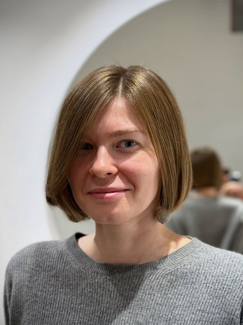 43. Straight Center-Parted Jaw-Length Bob