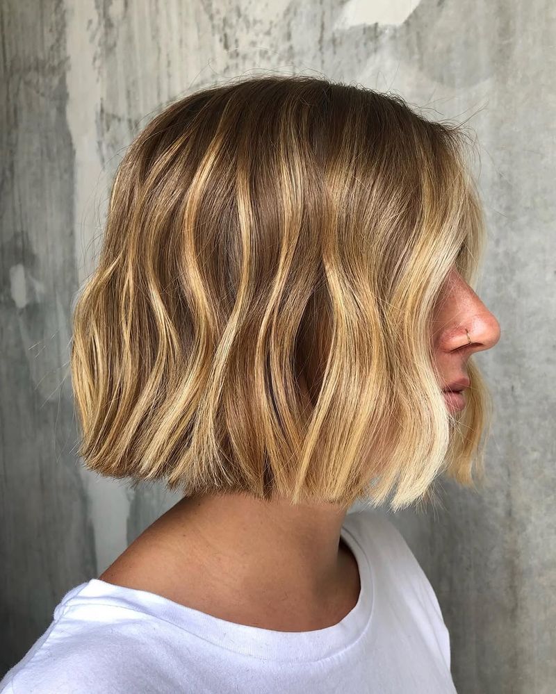 43. Sun-Kissed Wavy Blunt Cut