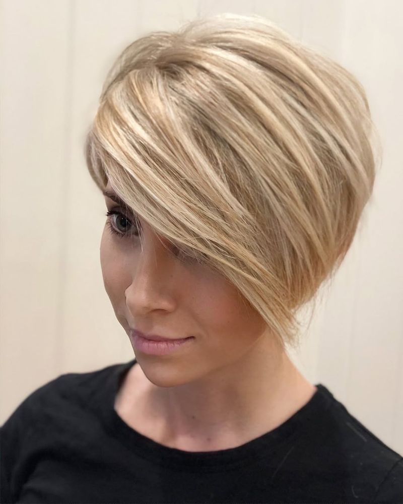 45. Sweeping Honey Blonde Asymmetric Cut