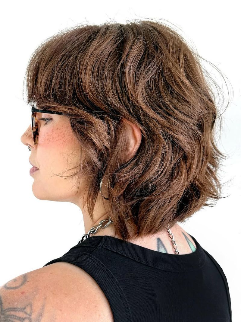 47. Textured Shaggy Bob with Full Bangs