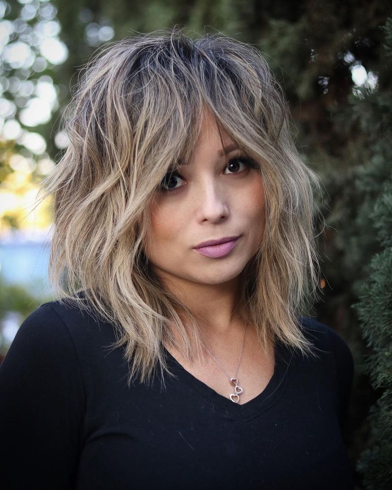 8. Tousled Ash Blonde Lob
