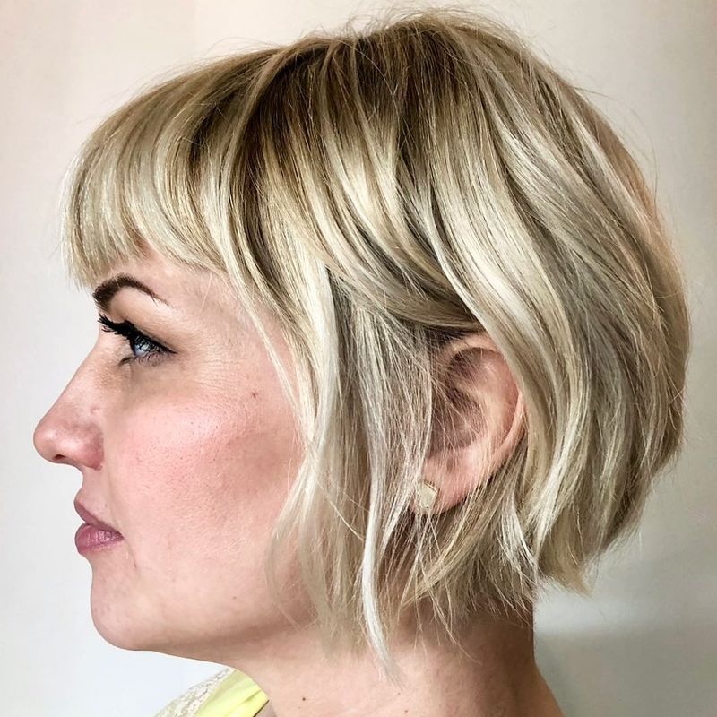 4. Tousled Blonde Bob with Short Bangs