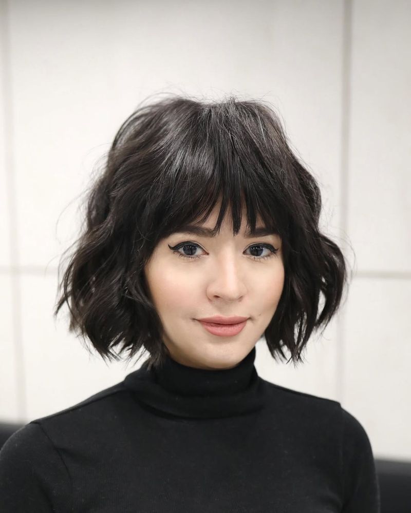 51. Tousled Dark Bob with Piecey Bangs